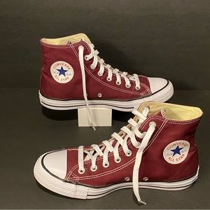 Burgundy Converse Chuck Taylor Hi Tops.  Gently used.  Women’s 10 / Men’s 8